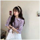 Camisa elegante informal con estampado floral retro